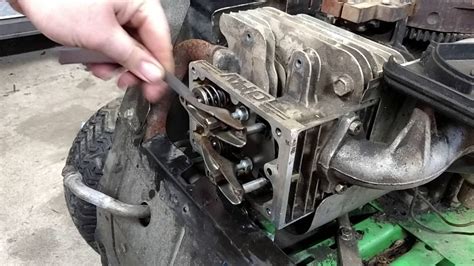 Adjusting valves briggs and stratton - Mower is having trouble starting. New spark plug, replaced starter, and tried adjusting valves: flywheel will still only make a partial rotation and then stops. When spark plug is removed, engine will crank fine. Any ideas? Mower is a Craftsman YT 3000 Model Number 917.28852. Engine is a Briggs and Stratton 21HP Model No. 331877-2371-G5. …